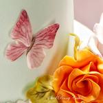 Hand painted 3D butterfly and sugar rose.